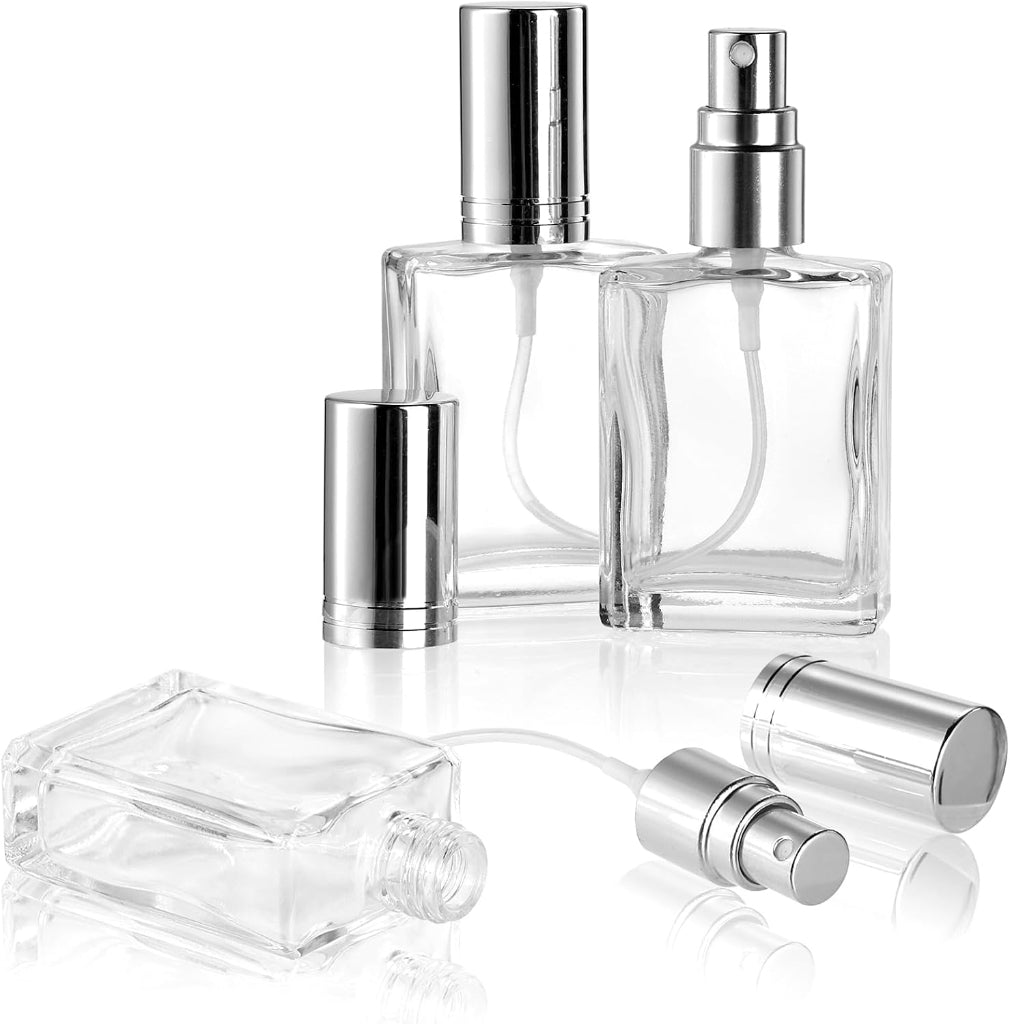 15ml square clear glass perfume bottles with silver caps on a white background