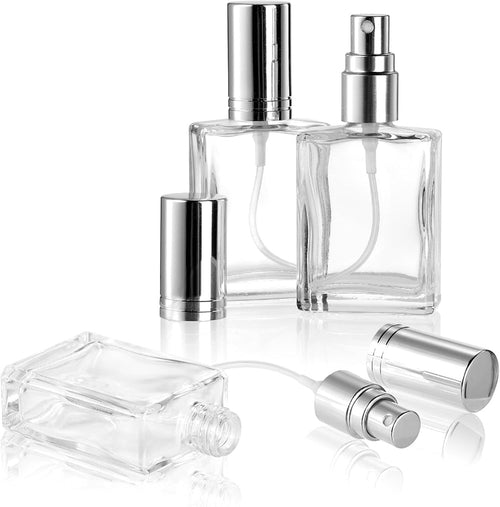 15ml square clear glass perfume bottles with silver caps on a white background