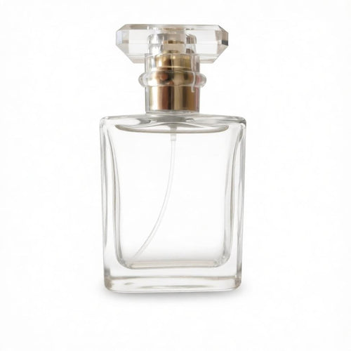 50ml square clear glass perfume bottle with a faceted transparent cap and metallic gold collar